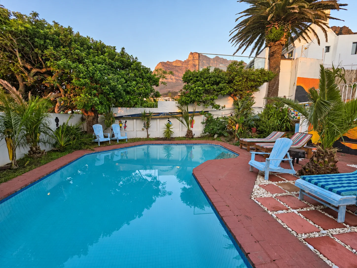 The pool and mountain at sunset